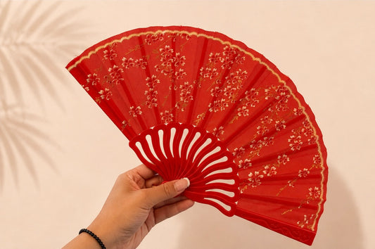 Eventail rouge à motif